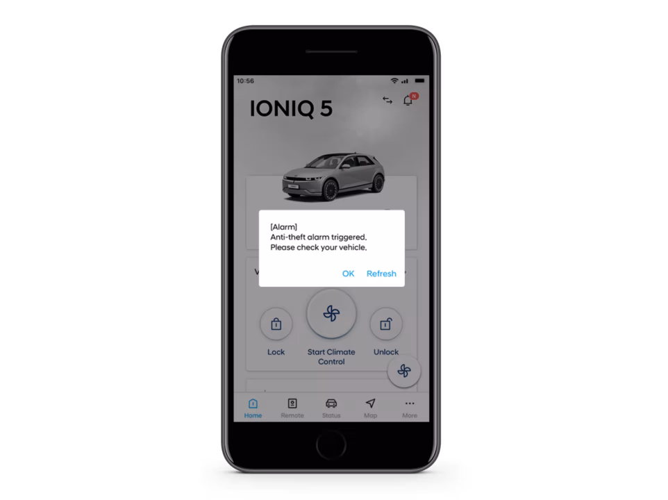 Close-up of the Hyundai Bluelink app with a theft detection push notification.